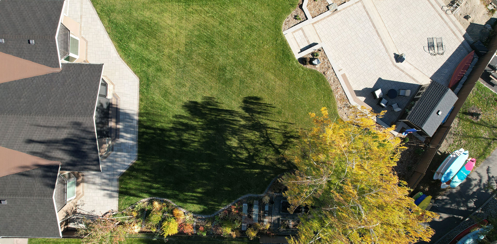 Aerial view of landscaped yard and patio