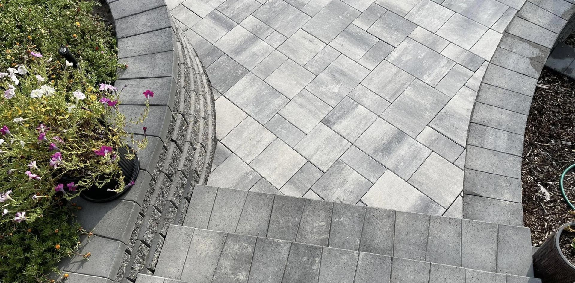 Landscaped walkway with retaining wall