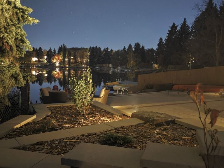 Outdoor lighting back deck overlooking water 768x576