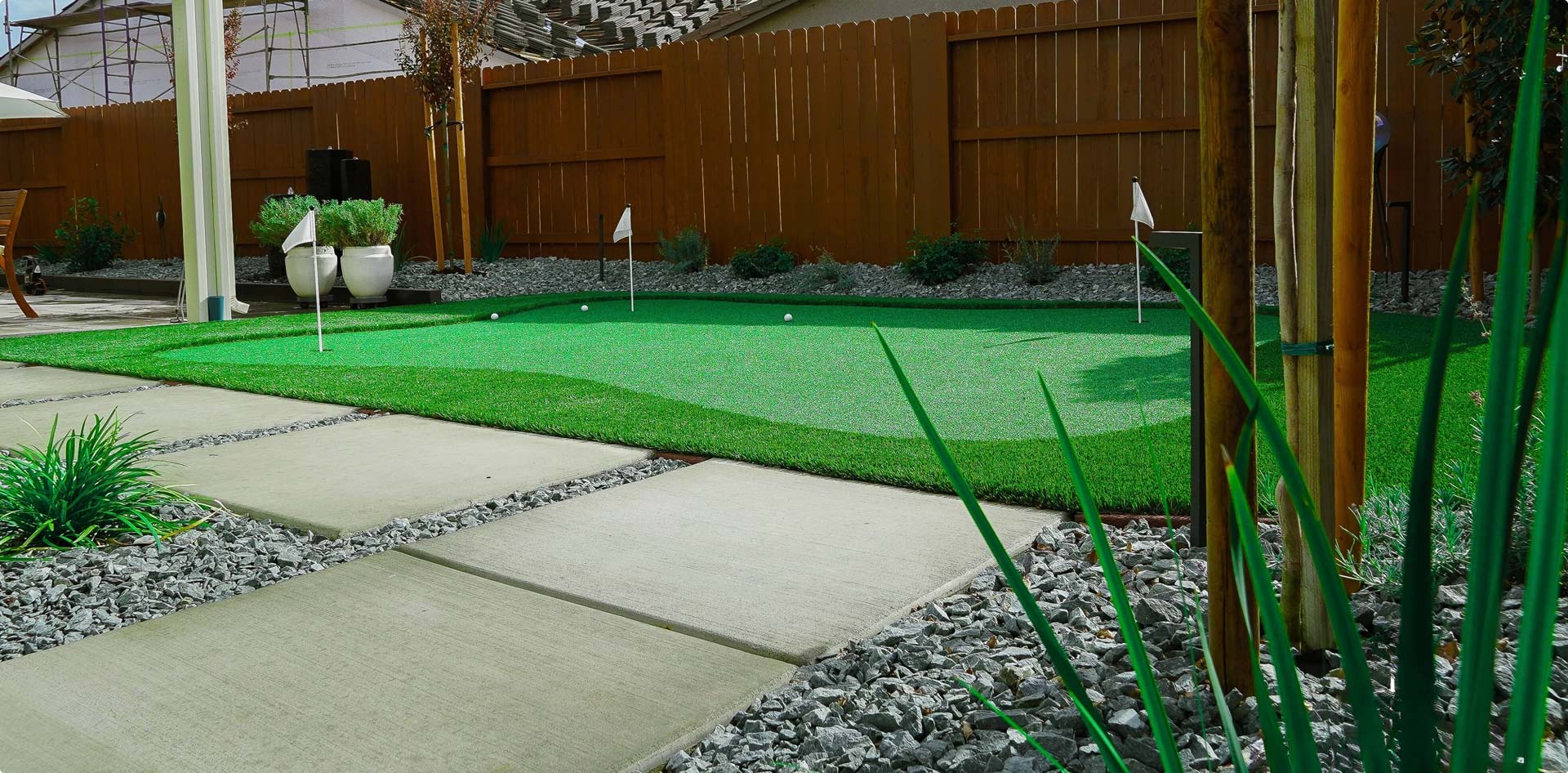 Outdoor putting green landscaped yard