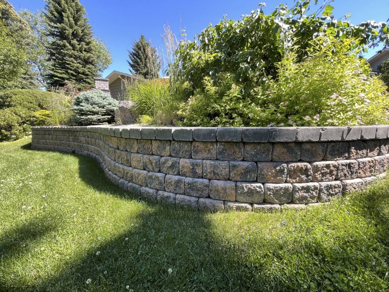 Retaining wall with shrubs 768x576