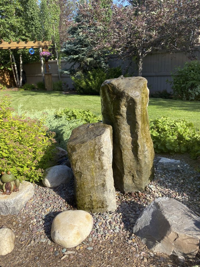 Stone water feature in yard 768x1024